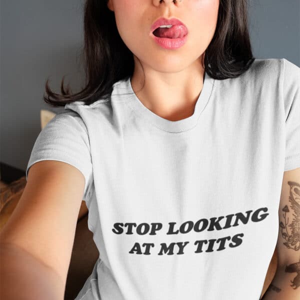 Woman wearing a stop looking at my tits t-shirt